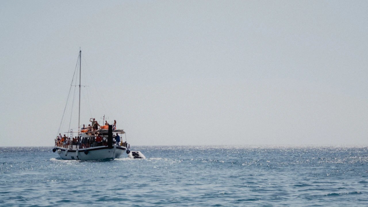 Tour boat with passengers out on the open sea