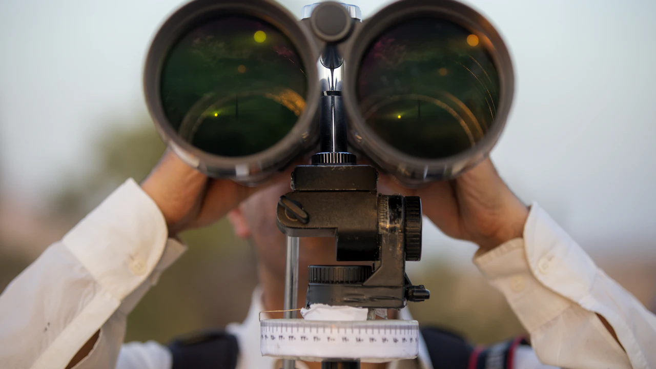 Large binoculars mounted on a tripod