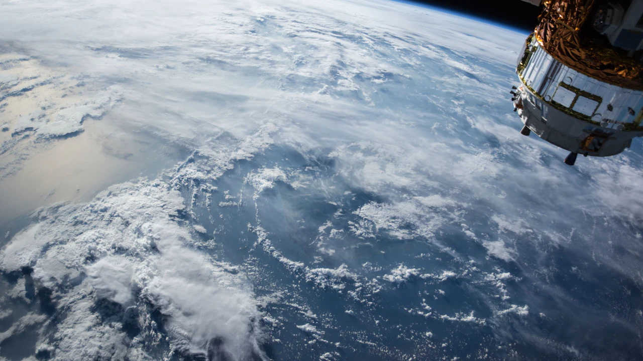 Satellite view of a large spiral hurricane over the open ocean
