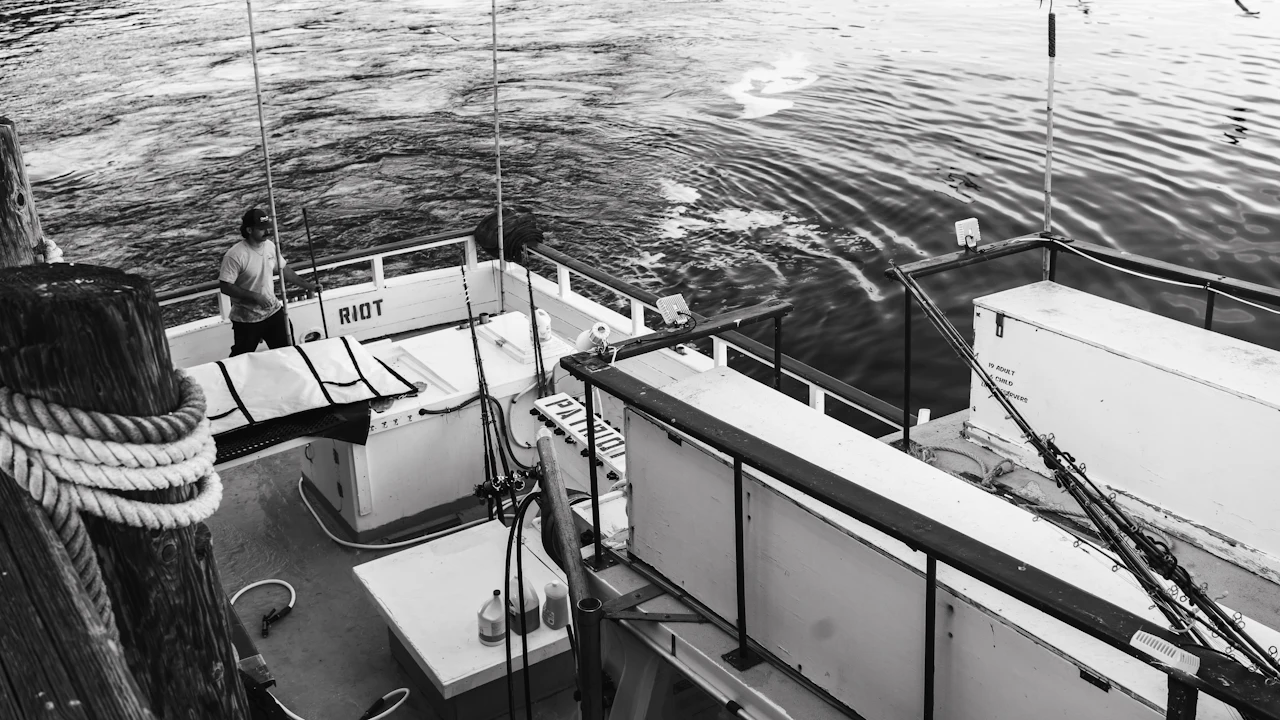 Black and white view of a boat deck from above