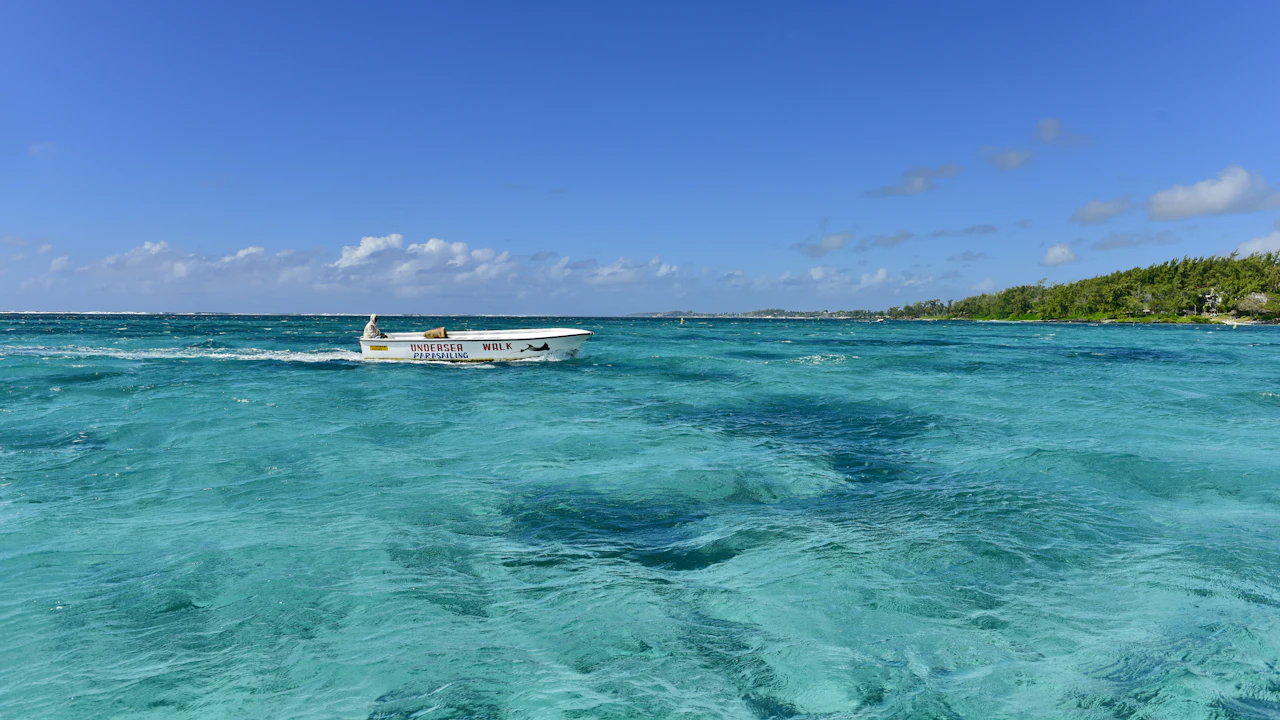 Small boat moored in clear turquoise water