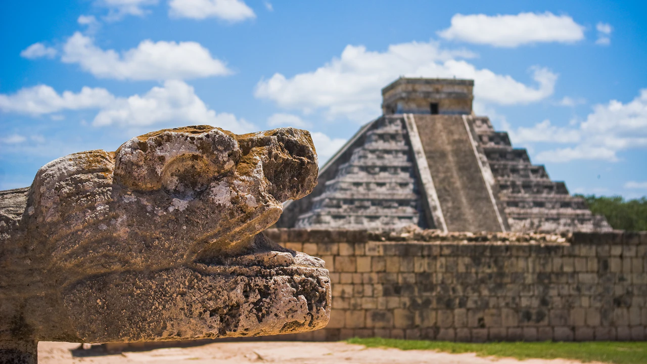 Maya stepped pyramid under a blue sky